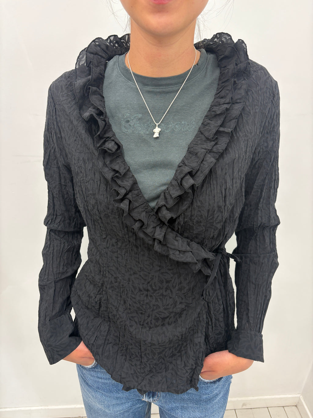 Black Crinkled Wrap Top with Ruffle Trim