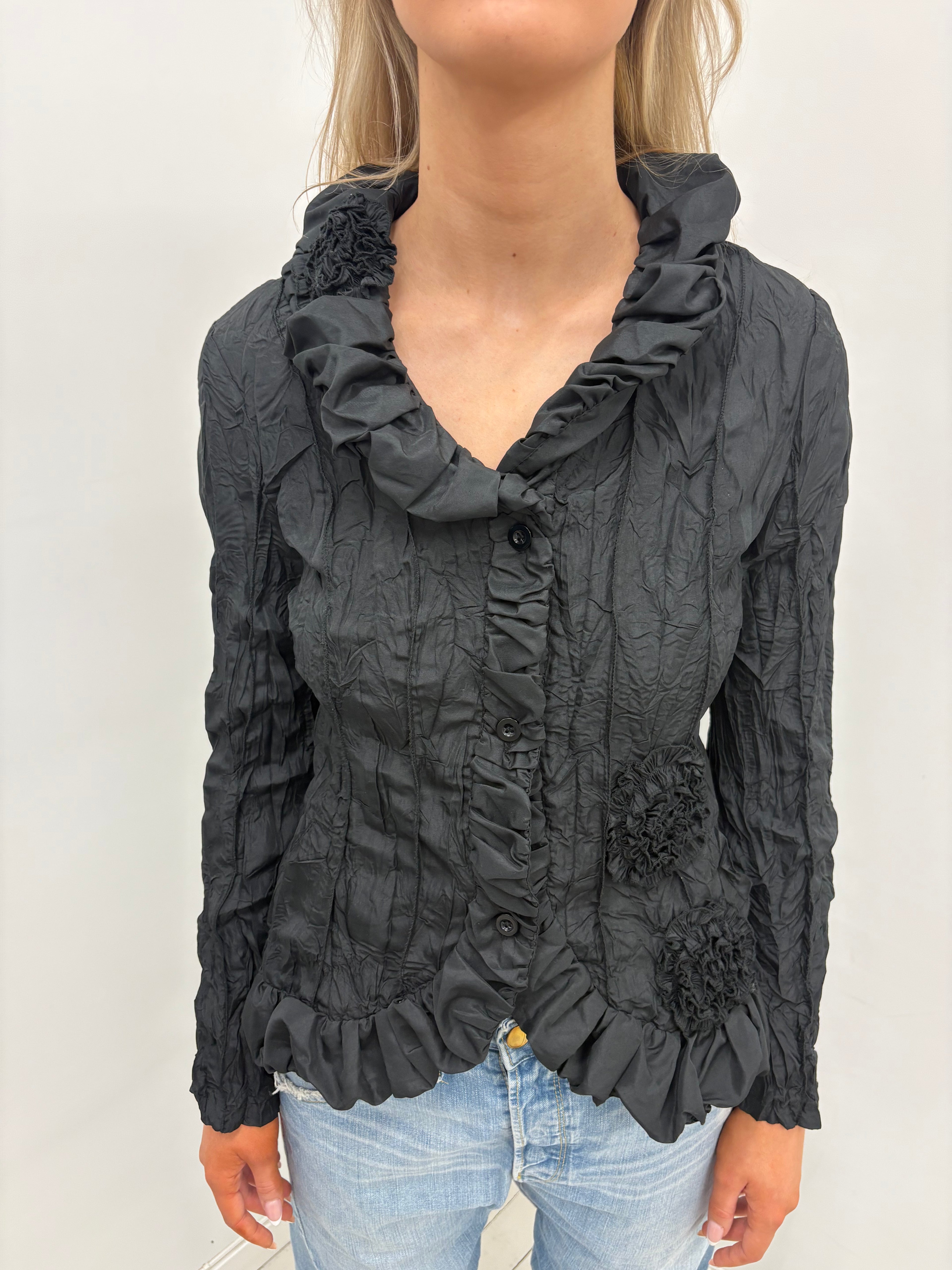 Ruffled statement blouse