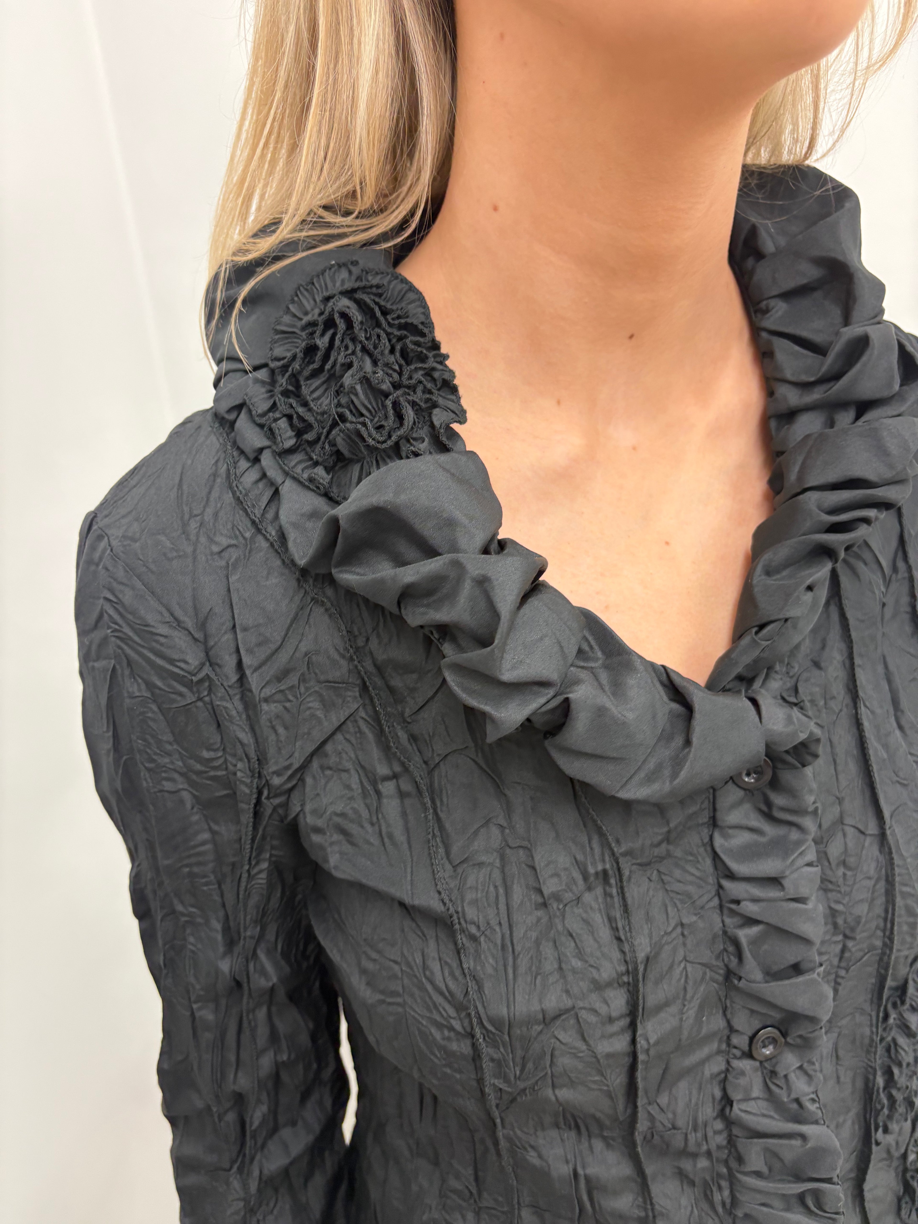 Ruffled statement blouse