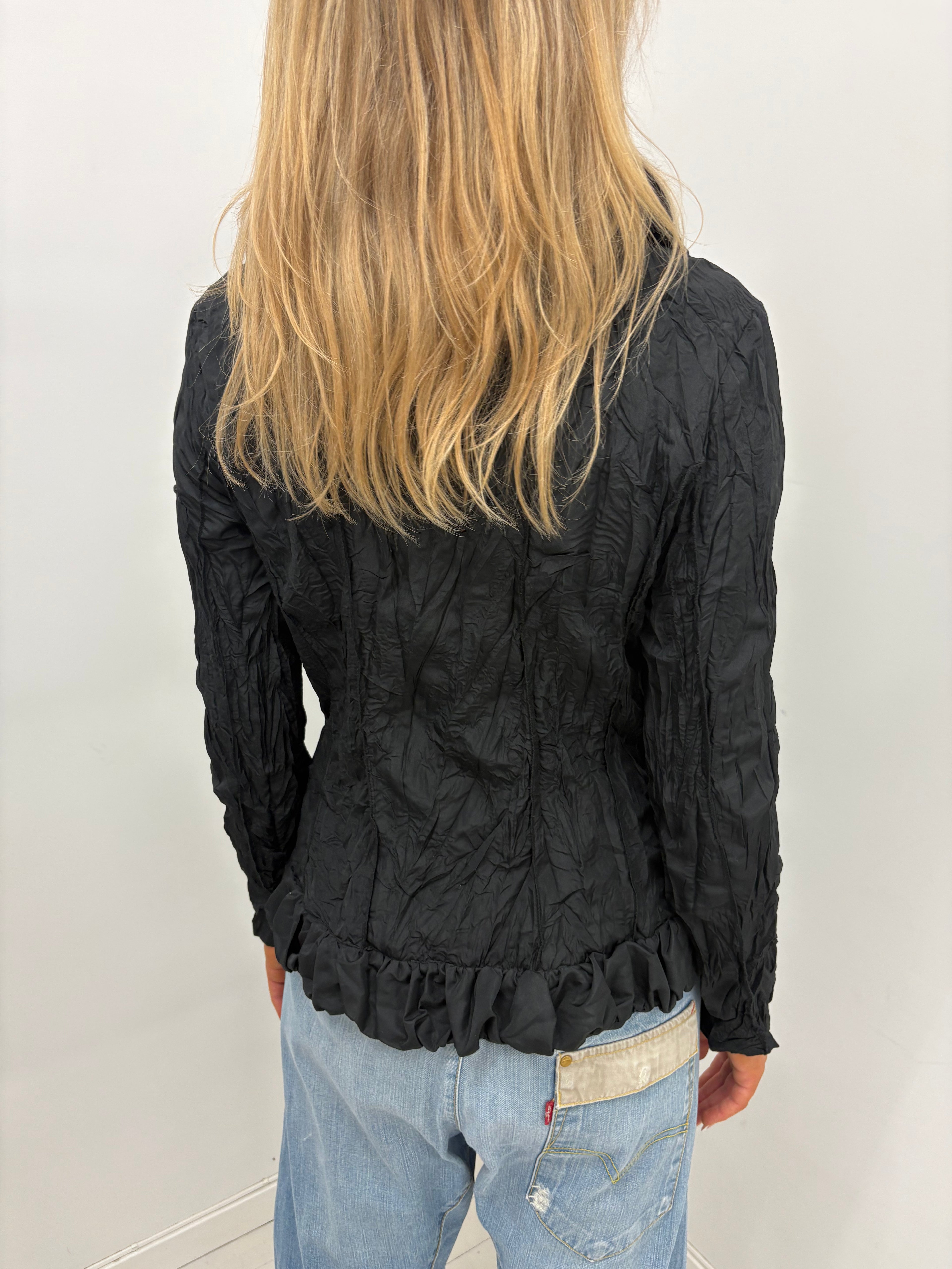 Ruffled statement blouse