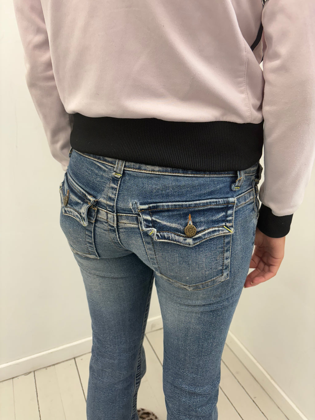 Mid Wash Low-Rise Bootcut Jeans Bronze Hardware