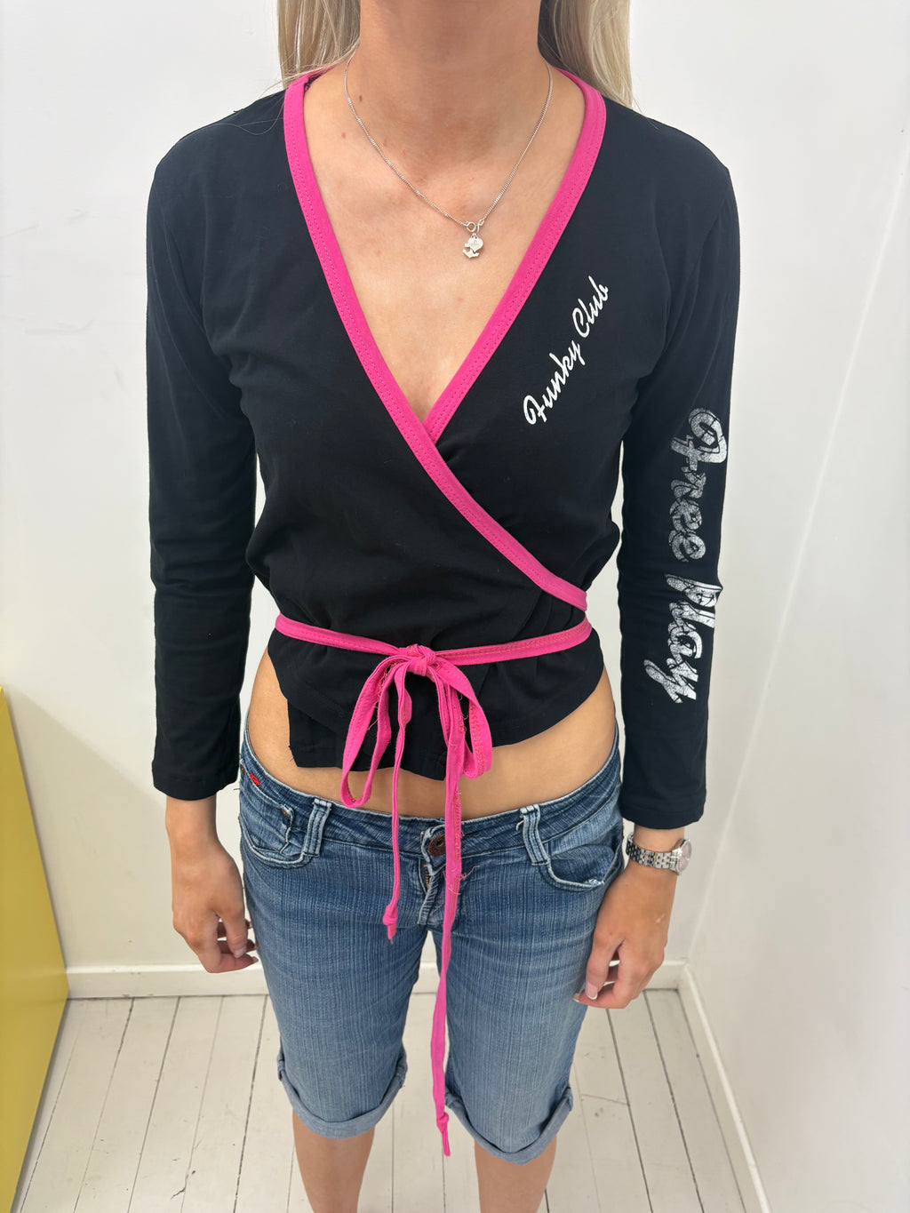 Black Wrap Top with Pink Trim and Funky Club Print