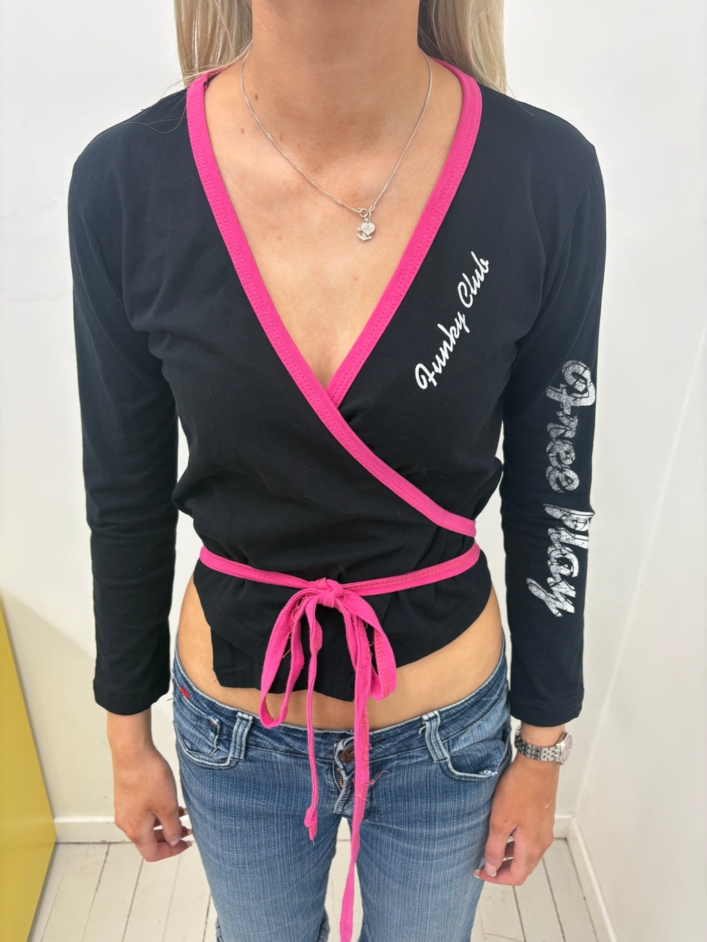 Black Wrap Top with Pink Trim and Funky Club Print