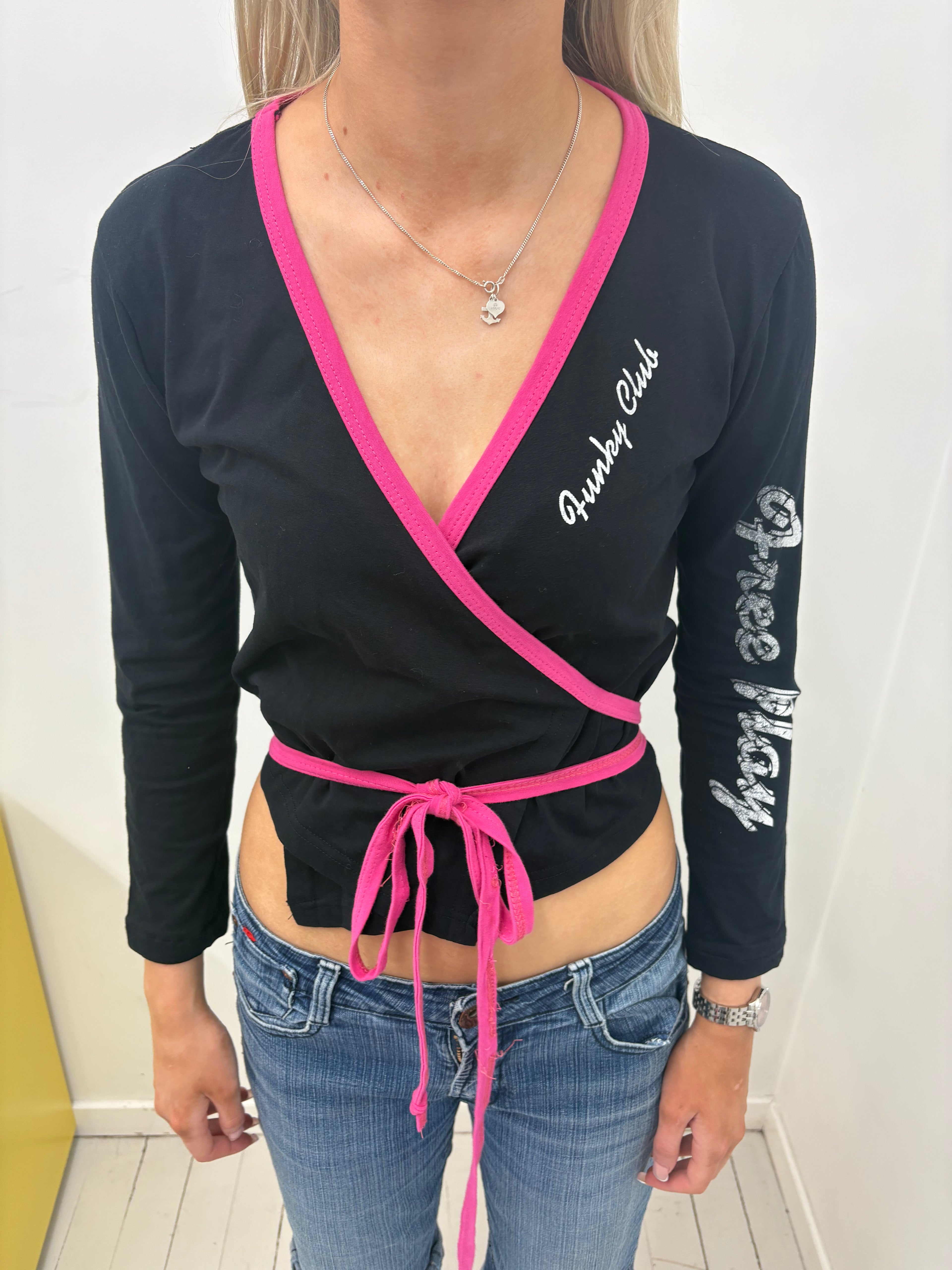Black Wrap Top with Pink Trim and Funky Club Print