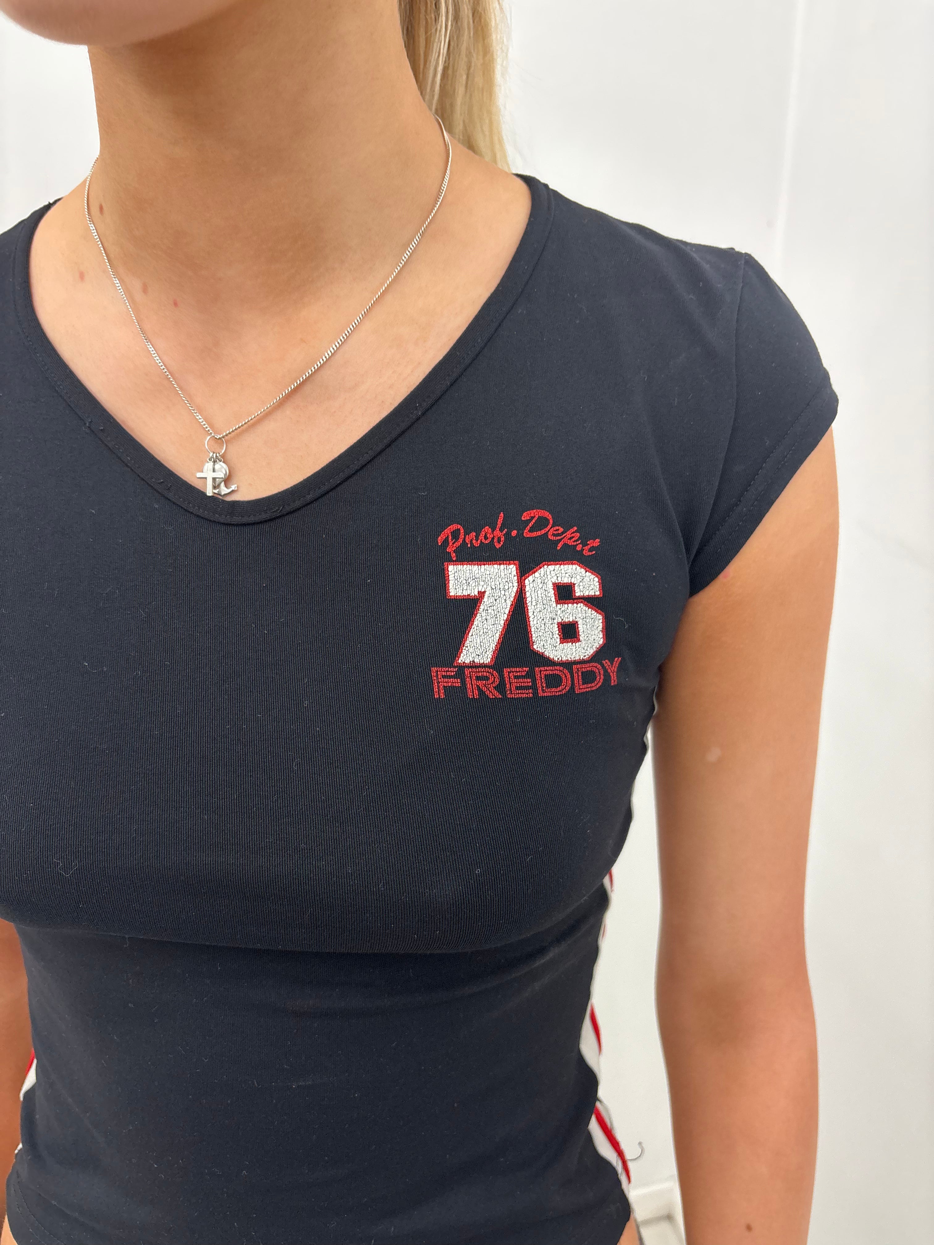 Black “Freddy 76” Fitted Baby Tee