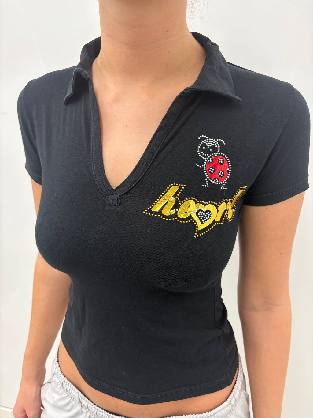 Black “Honey” Ladybug Polo Top
