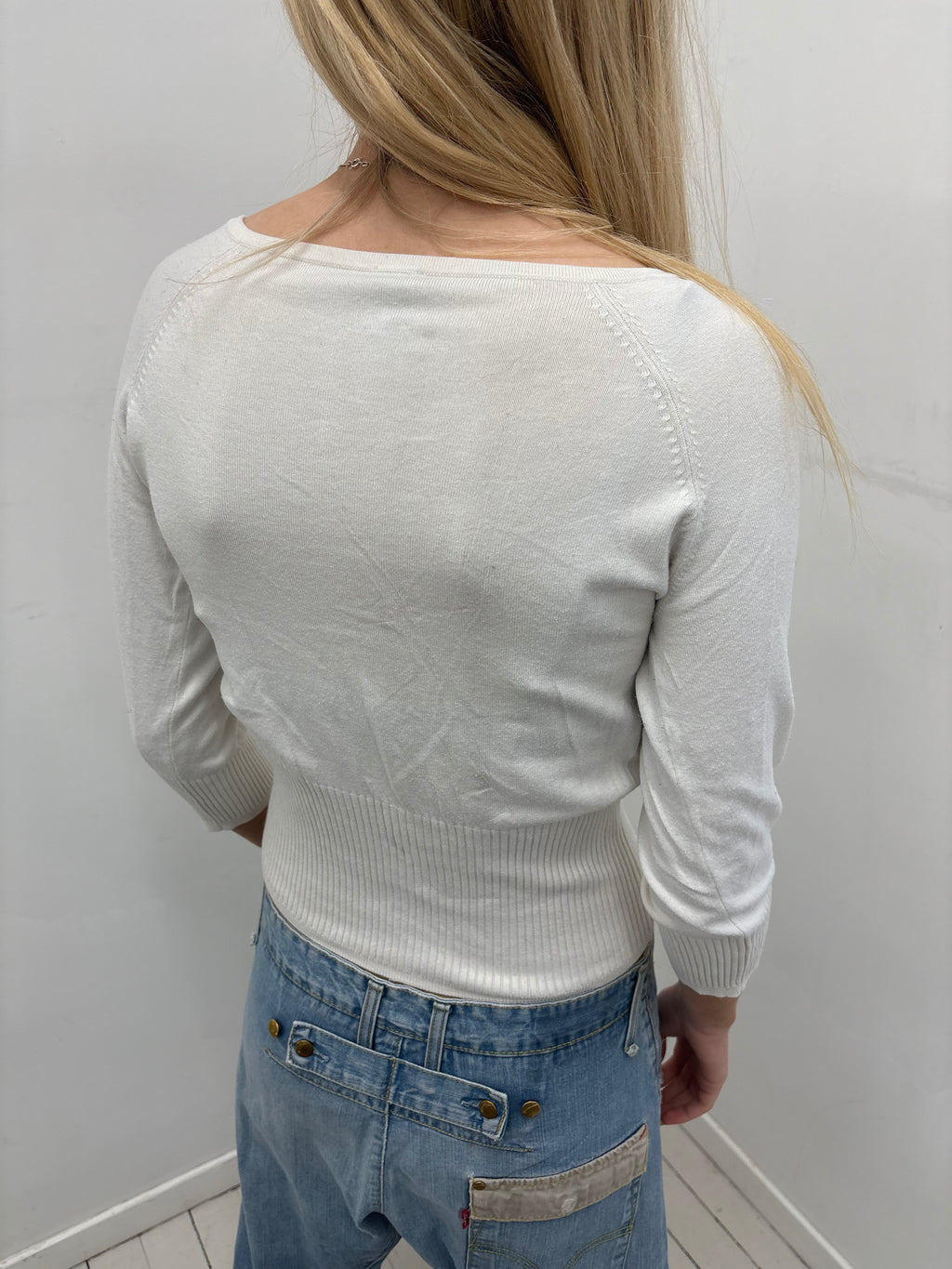White V-Neck Sweater with Pastel Appliqué Details