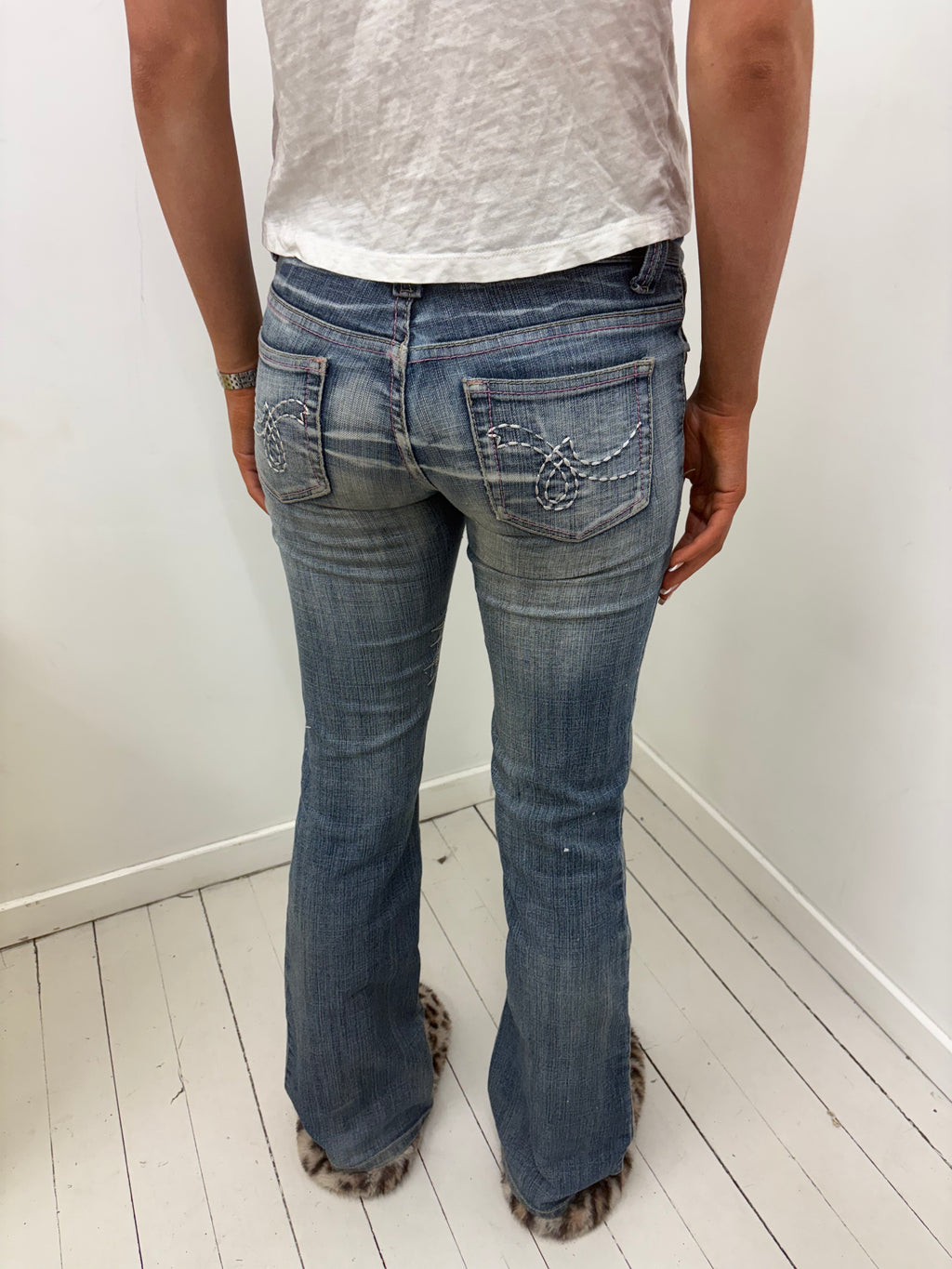 Distressed Bootcut Jeans Silver Stitch Patch Detail