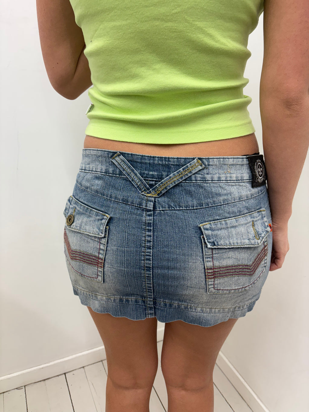 Low-Rise Faded Denim Micro Mini Skirt